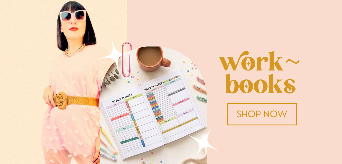 A promotional banner featuring a woman in a pink outfit and sunglasses holding a pink polka-dot planner, alongside an open weekly planner, a coffee cup, and the text 'work books' and 'SHOP NOW' on a peach background.